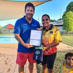 Pool Manager Steve Waterman presenting Shonece with her Bronze Medallion certificate