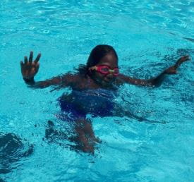 An aboriginal girl in the pool at Warmun