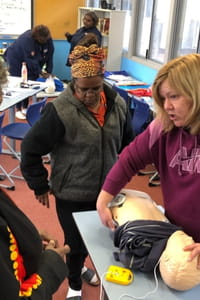 First Aid trainer with students in Wiluna