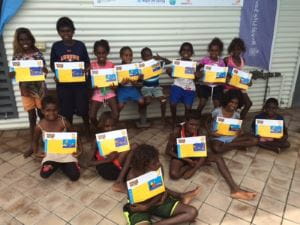 Aboriginal children holding up their Swim and Survive certificates