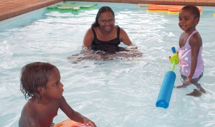 Toddlers in the pool with their mum at Yandeyarra