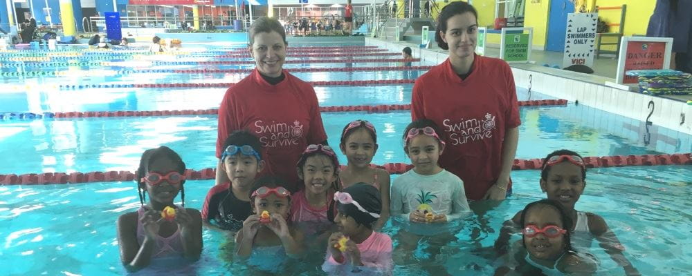 multicultural children with two swim instructors in the pool at Bayswater Waves