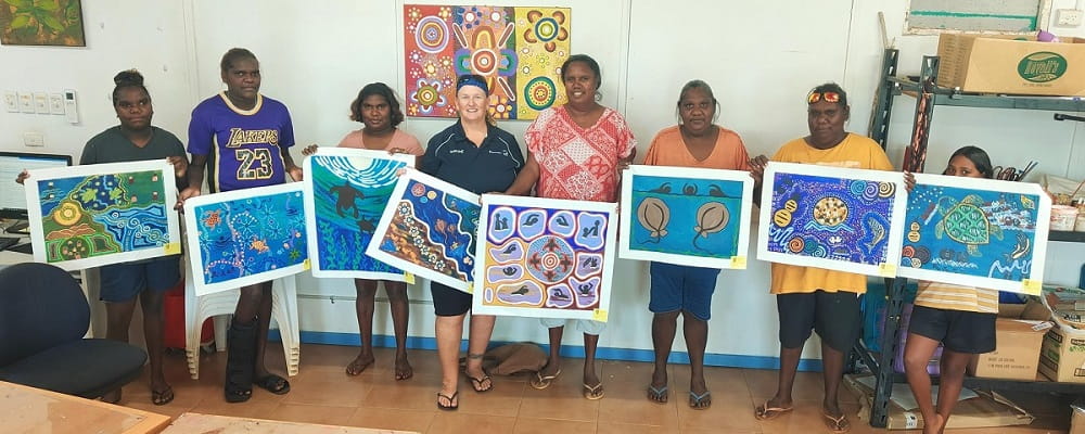 Bidyadanga artists with their Swim and Survive art pieces