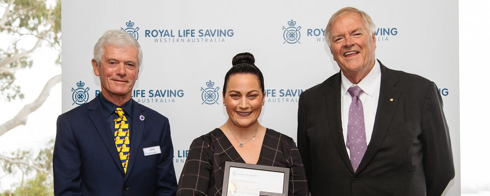Samantha Laine receiving bravery award