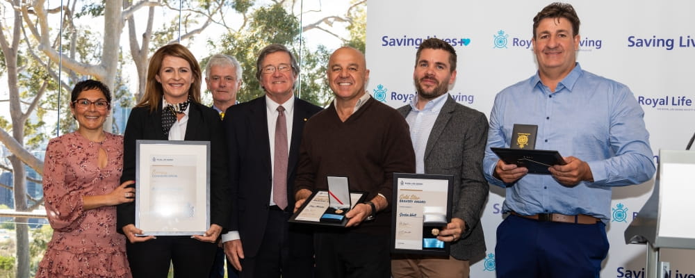 Bravery Awardees from Bristow Helicopters Australia pose with Colin Hassel and Wayne Martin AC