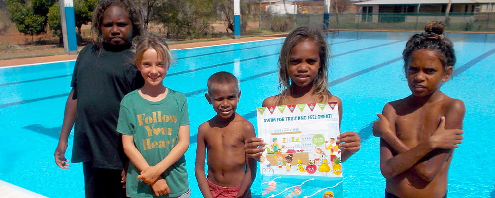 Five Burringurrah children standing in front of the local pool