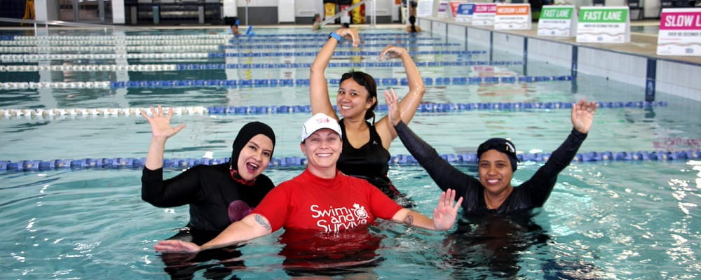 CaLD women enjoying a swimming lesson