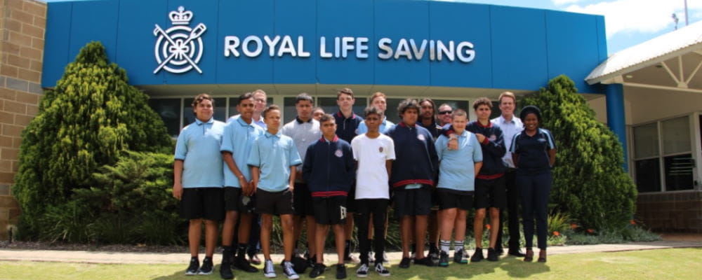 A group of Clontarf students standing outside the Royal Life Saving building