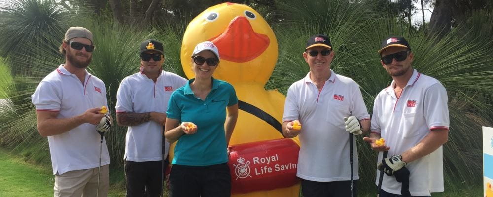 golfers gathering around our inflatable Quackers duck at the SPASA WA Golf Day