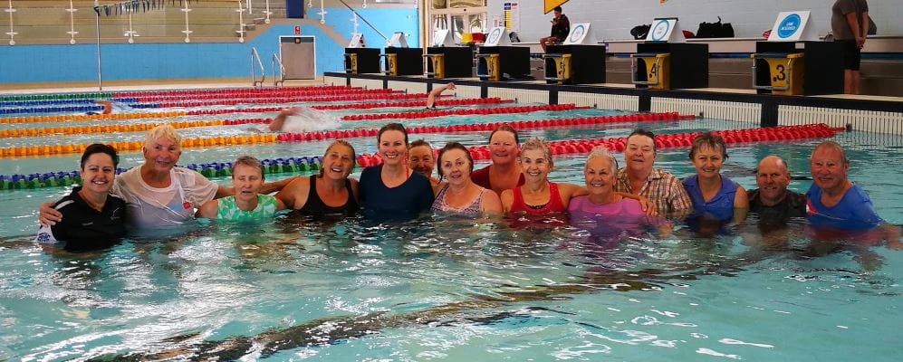 A group of seniors swim together as part of the recent Grey Medallion program