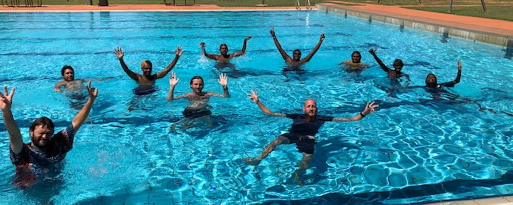 Participants with their instructor Glenn Taylor in the pool at Halls Creek