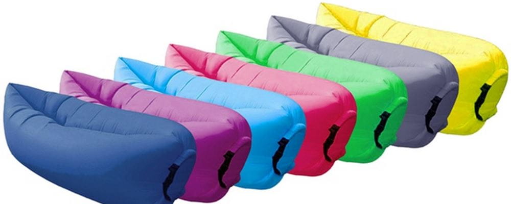 image of several inflatable loungers of various colours side by side