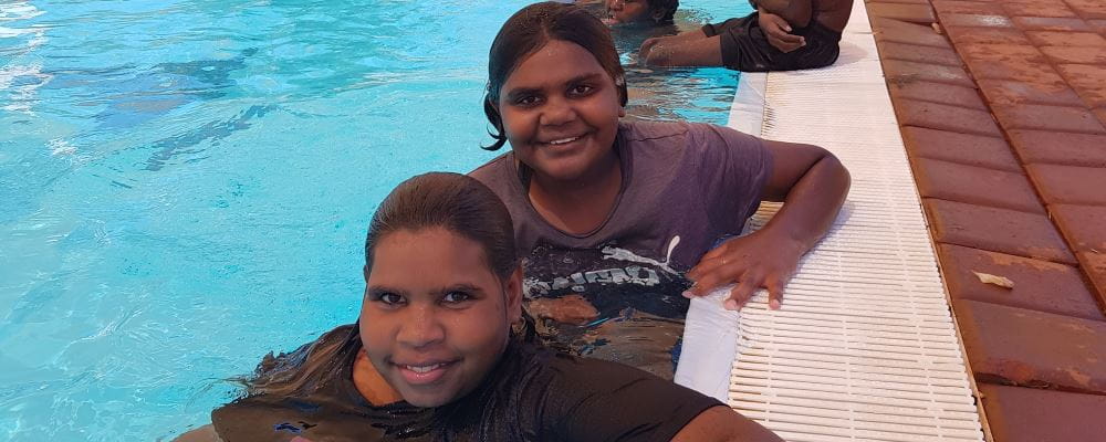 Two aboriginal children in the pool at Jigalong