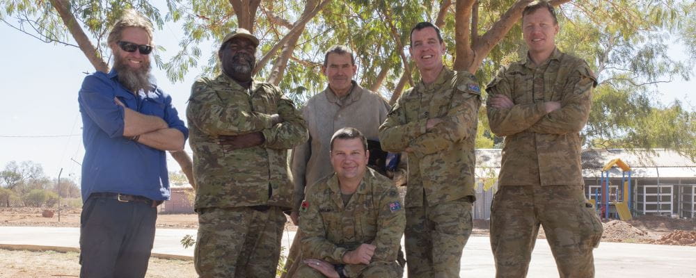 Ryan (Jigalong Shed Manager), Jigalong local and Army Reservist Darryl ‘DJ’ Jones alongside AACAP personnel Stewy, Capt Brendan Fox, Chris and Nathan (seated).