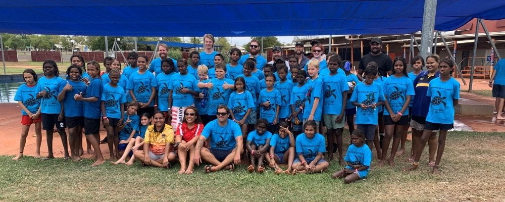 A group of Kimberley children with their teachers gathered as a group at the Spirit Carnival