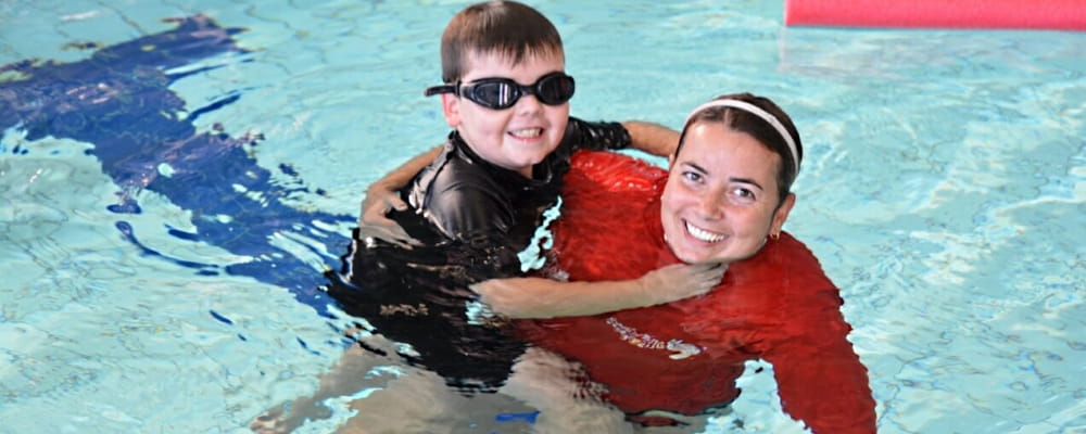 Lucas Walsh with instructor Tanya Jeffrey in the pool at Kwinana Recquatic