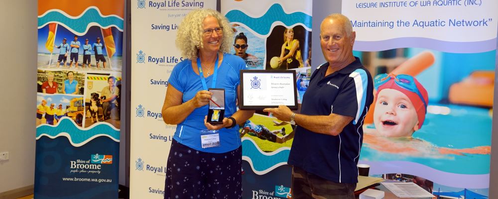 Image of Stephanie Culling with and Dave Cummins with Stephaniue's award