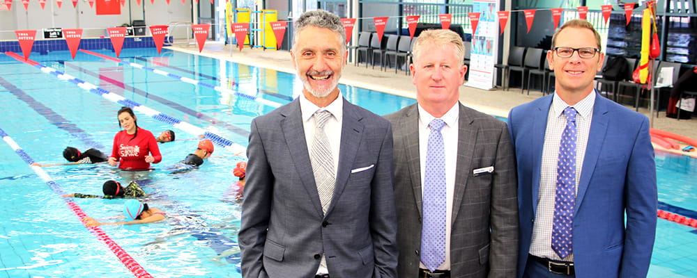 Minister for Sport and Recreation Dr Tony Buti, City of Swan Mayor Kevin Bailey and Royal Life Saving WA CEO Peter Leaversuch  by the pool at Swan Active Ballajura