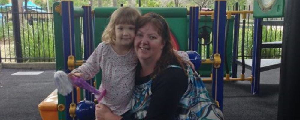 Michelle Ostler with daughter Jewel at a playground