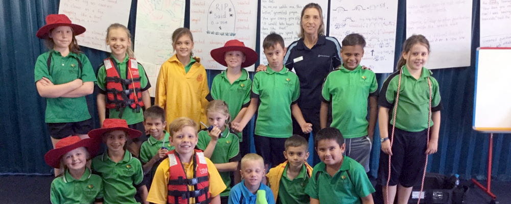 Newman school children with RLSSWA's Jacqui Forbes during their water safety talk