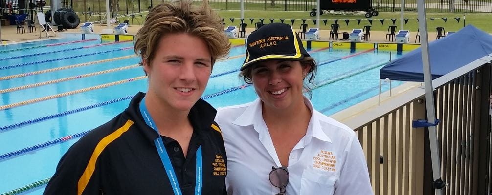 image of Lachlan Meldrum with team coach Sarah Hamilton in front of the pool at the Pool Lifesaving Championships