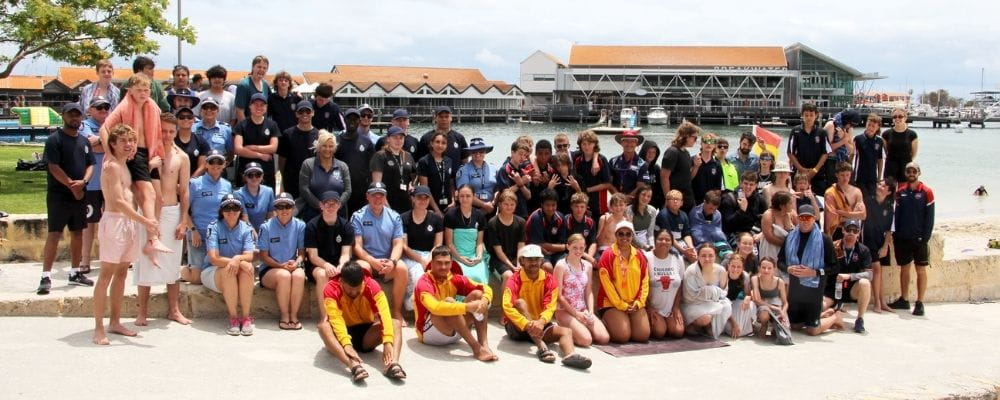 Students with their teachers, lifeguards and police volunteers at Hillarys Boat Harbour