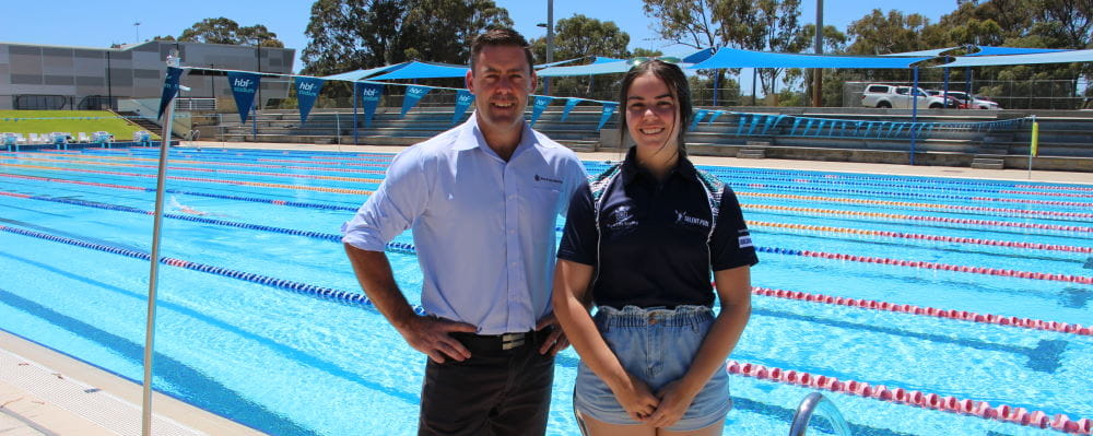 RLSSWA Senior Manager Workforce Solutions, Travis Doye, with Bree Bugeja by the pool at HBF Stadium