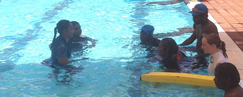 Aboriginal youth in the pool at Jigalong learning lifesaving skills