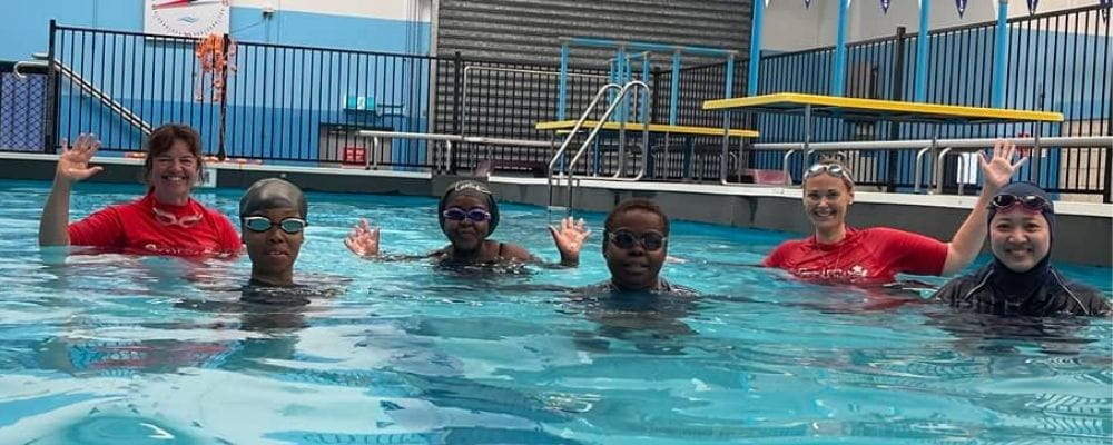 Multicultural women at a special swimming lesson program