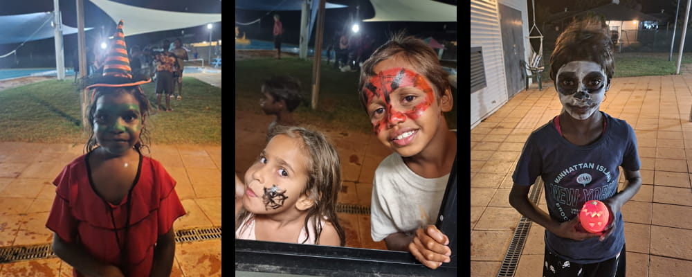 Warmun children with painted faces at a Halloween party