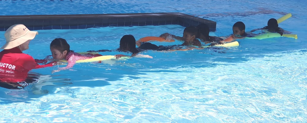 school students in Warmun at a swimming lesson