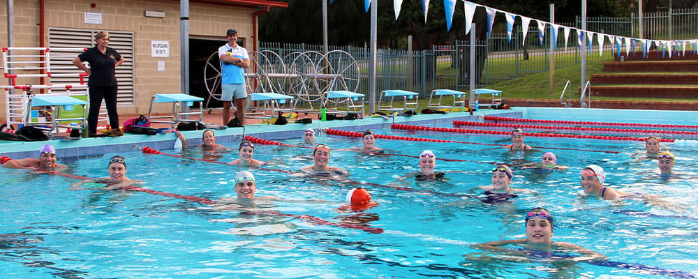 A group of Pool Life Saving athletes in the pool at Newman College