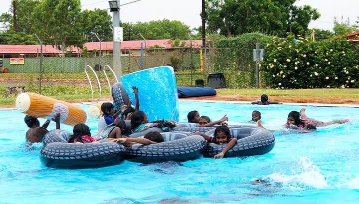 children enjoying the aqua run at Bidyadanga pool