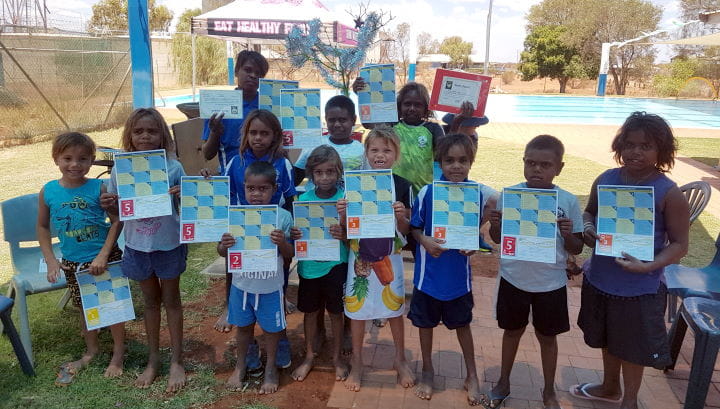 Burringurrah children with their swimming certificates at their local pool