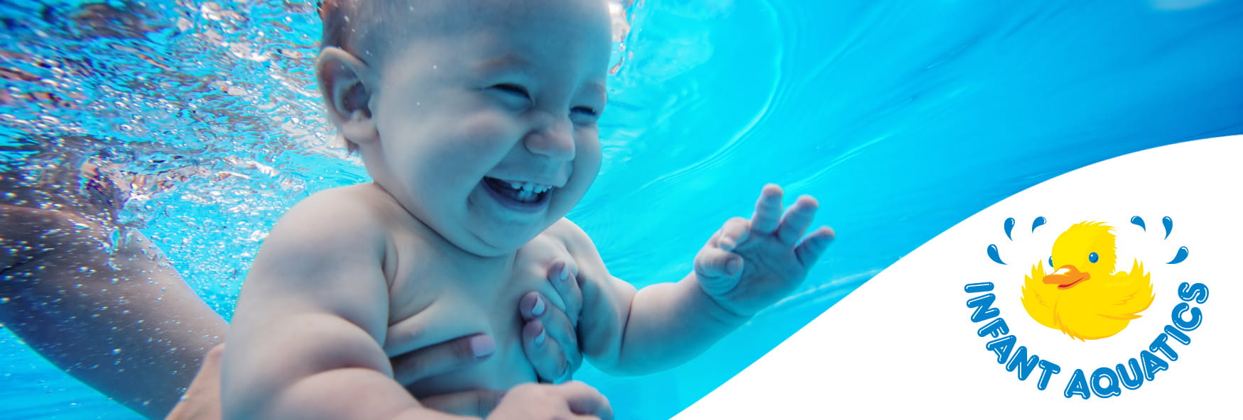 baby smiling underwater