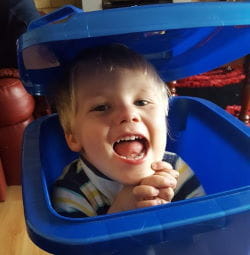 Jake in a blue wheelie bin
