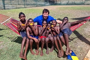 Warmun remote pool manager Steve Waterman with some of the local kids