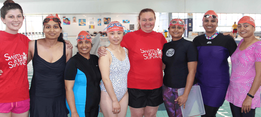group of multicultural women at a swimming lesson