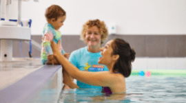 Mercy baby swim parent with child