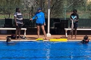 Di Crisp teaching a Bronze Medallion course with Yulara College students