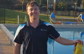 image of Mitch Burdan standing by the pool at Central Aquatic