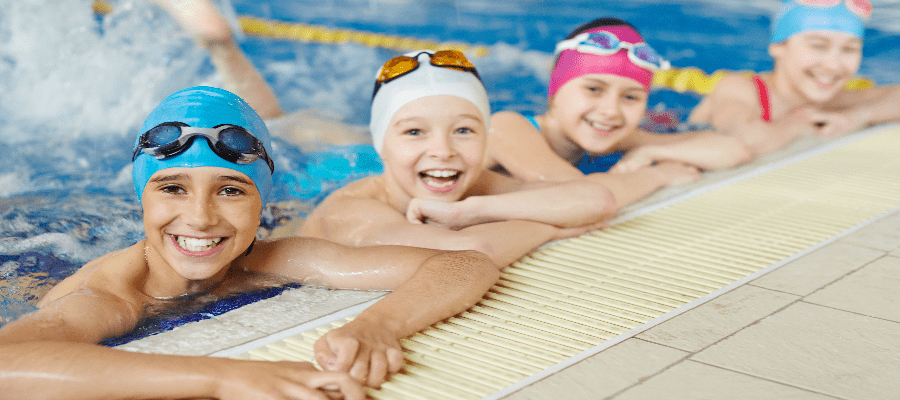 Swimming students in a pool