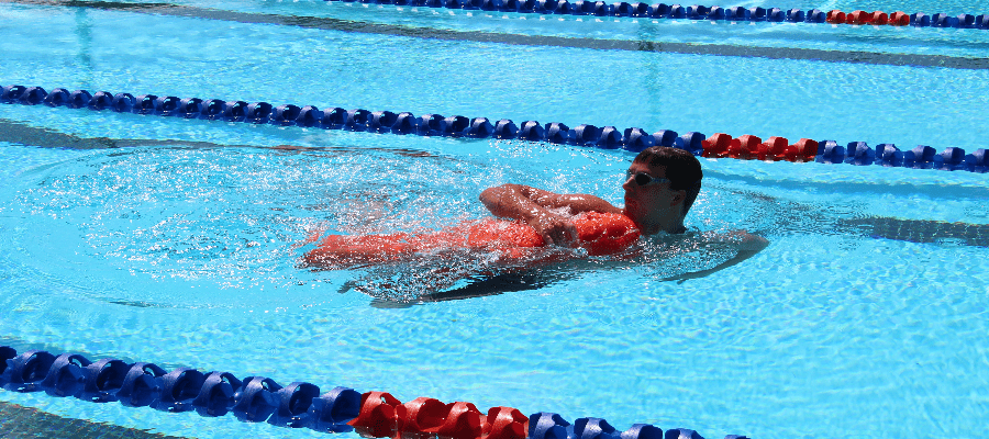 Pool lifeguard saving a person