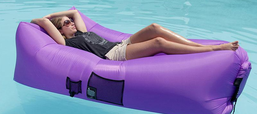 woman lying on inflatable air lounger