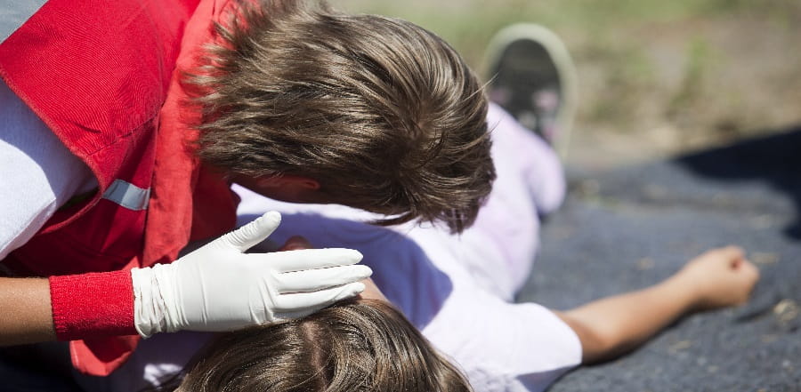 A person treating a concussion